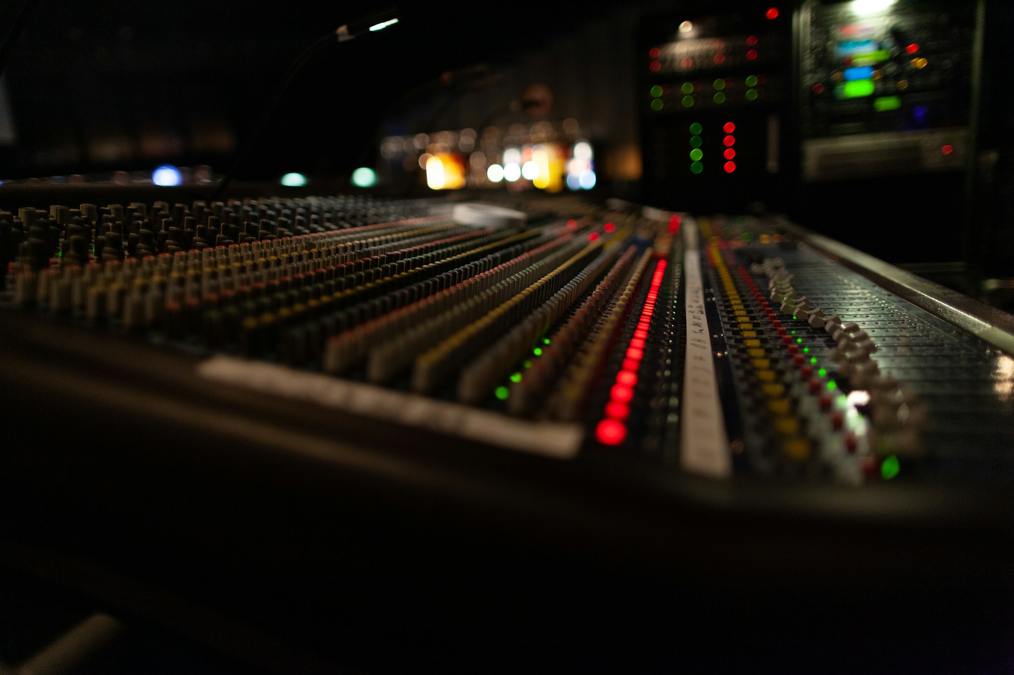 Mixer control. Music engineer. Backstage control. Professional audio mixing console with light